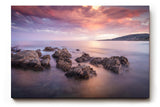 Sinus Art Wandbild 120x80cm Sanfte Wellen, Felsen im Wasser und ein farbintensiver Abendhimmel schaffen Harmonie und Weite