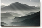 Sinus Art Wandbild 120x80cm Faszinierende Lichtstrahlen durchdringen den Morgennebel über mystischen Berglandschaften