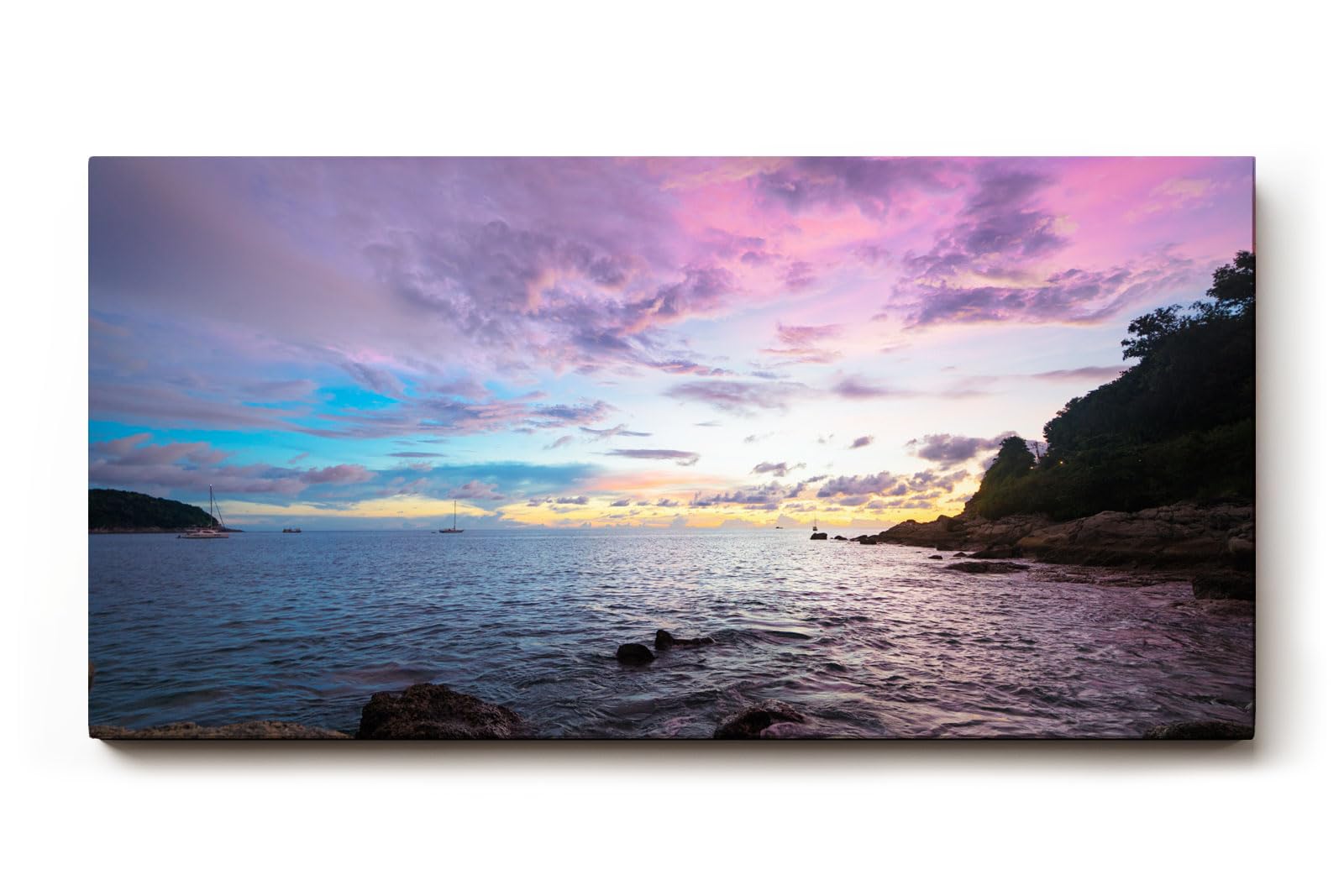 Sinus Art Wandbild 120x80cm Dramatisch ruhige Szene einer felsigen Küste bei Sonnenuntergang in pastelligen Tönen