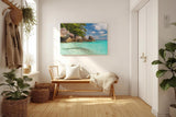 Sinus Art Wandbild 120x80cm Feinsandiger Strand mit Felsen und türkisfarbenem Wasser – paradiesisch und entspannend