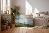 Sinus Art Wandbild 120x80cm Weite grüne Hügel und Berge unter wolkenverhangenem Himmel mit Lichteinfall