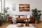 Sinus Art Wandbild 120x80cm Faszinierende Gesteinsformationen unter goldenem Himmel in Western-Atmosphäre