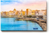 Sinus Art Wandbild 120x80cm Pastellfarbene Häuserzeile an der Küste vor türkisblauem Meer – mediterranes Flair pur