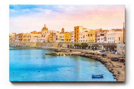 Sinus Art Wandbild 120x80cm Pastellfarbene Häuserzeile an der Küste vor türkisblauem Meer – mediterranes Flair pur