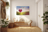 Sinus Art Wandbild 120x80cm Herzförmiger Baum in pinker Blüte in weiter Frühlingslandschaft mit Blumenwiese
