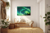 Sinus Art Wandbild 120x80cm Atemberaubende Aurora Borealis mit dynamischem Farbspiel über Silhouetten dunkler Bäume
