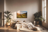 Sinus Art Wandbild 120x80cm Grüne Hügel unter strahlender Sonne mit leuchtenden Bäumen und weiter Perspektive