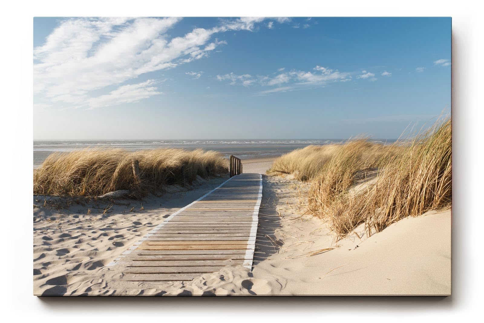 Sinus Art Wandbild 120x80cm Idyllischer Holzsteg durch Dünenlandschaft unter blauem Himmel bis zum Meer
