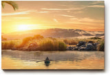 Sinus Art Wandbild 120x80cm Einzelnes Boot auf ruhigem Wasser bei Sonnenuntergang – Natur pur auf Leinwand