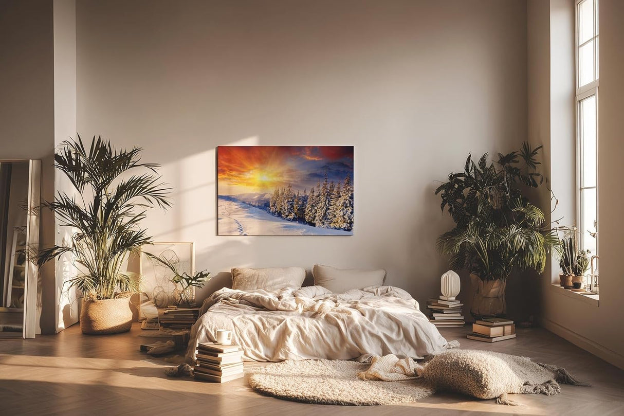 Sinus Art Wandbild 120x80cm Schneebedeckter Nadelwald im Morgenlicht – intensiv, leuchtend und ruhig zugleich