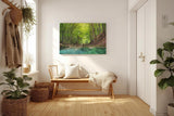 Sinus Art Wandbild 120x80cm Friedlicher Fluss mit glasklarem Wasser inmitten eines grünen Laubwaldes
