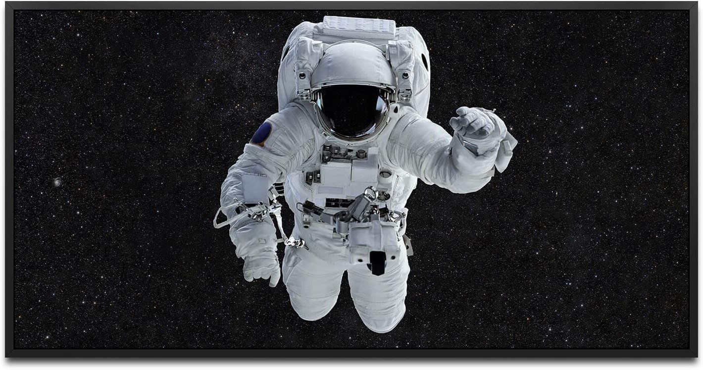 Astronaut im Weltall ca. 130x70cm Wandbild inklusive Schattenfugenrahmen schwarz - Panorama Leinwand Bild XXL Format Wandbilder Wohnzimmer Wohnung Deko Kunstdrucke