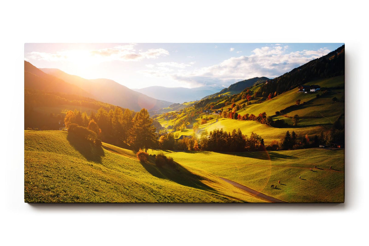 Sinus Art Wandbild 120x80cm Grüne Hügel unter strahlender Sonne mit leuchtenden Bäumen und weiter Perspektive