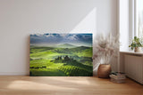 Sinus Art Wandbild 120x80cm Leuchtend grüne Weinberge und Hügel mit typischen Zypressen und Villa