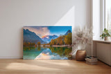 Sinus Art Wandbild 120x80cm Bunt gefärbter Herbstwald am See mit Spiegelung vor alpiner Kulisse für harmonische Raumwirkung