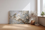 Sinus Art Wandbild 120x80cm Anmutiger Vogel auf einem Ast mit weißen Blüten vor harmonischem Hintergrund – ruhig und ausdrucksstark