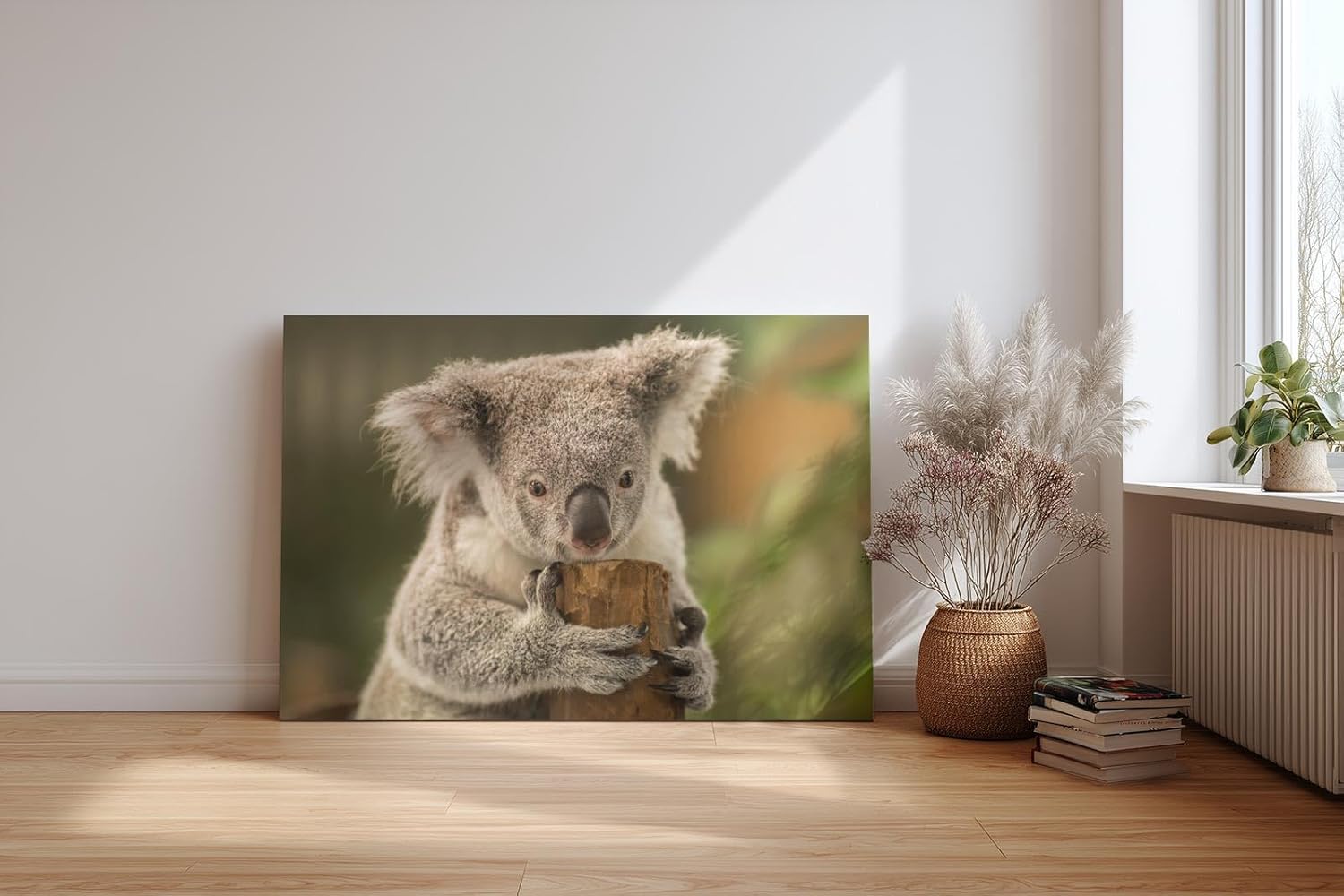 Sinus Art Wandbild 120x80cm Liebevolle Tieraufnahme mit Koala in natürlicher Pose vor ruhiger Kulisse