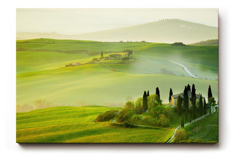 Sinus Art Wandbild 120x80cm Traumhafte Aussicht über die grünen Hügel der Toskana im frühen Sonnenlicht