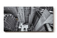 Sinus Art Wandbild 120x80cm Atemberaubende Ansicht einer Metropole aus der Vogelperspektive in Schwarzweiß mit gelben Taxis