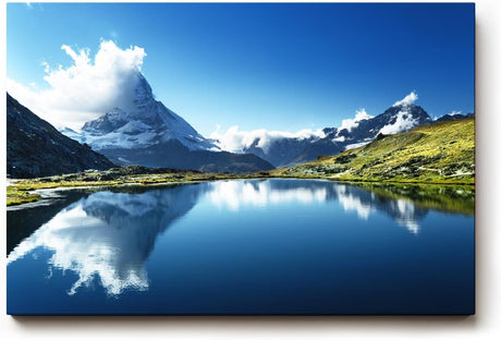 Sinus Art Wandbild 120x80cm Majestätisches Matterhorn reflektiert sich in klarem Bergsee unter blauem Himmel