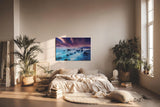 Sinus Art Wandbild 120x80cm Mystische Felsenküste bei Nacht unter violettem Himmel mit leuchtendem Wasser