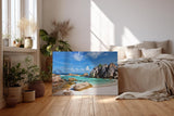 Sinus Art Wandbild 120x80cm Türkises Wasser, weißer Sand und markante Felsen – Urlaubsstimmung pur auf Leinwand