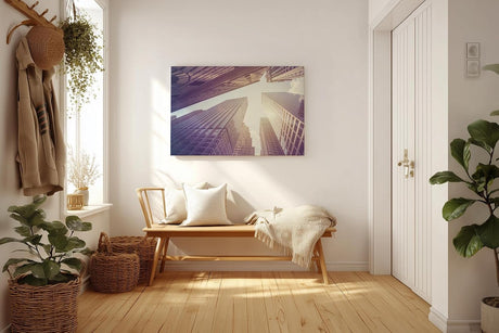 Sinus Art Wandbild 120x80cm Gigantische Hochhäuser treffen auf strahlenden Himmel im vertikalen Blickwinkel