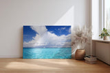 Sinus Art Wandbild 120x80cm Weitläufiger Horizont mit türkisfarbenem Wasser und dramatischer Wolkenbildung
