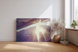 Sinus Art Wandbild 120x80cm Gigantische Hochhäuser treffen auf strahlenden Himmel im vertikalen Blickwinkel