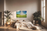 Sinus Art Wandbild 120x80cm Weite Frühlingswiese mit gelben Blüten und strahlendem Himmel für fröhliche Atmosphäre