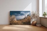 Sinus Art Wandbild 120x80cm Markante Felsformationen unter blauem Himmel in dramatischer Weite