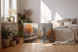Sinus Art Wandbild 120x80cm Stimmungsvolle Darstellung von Amsterdam mit Kanal Brücke und Altstadt bei herbstlichem Licht