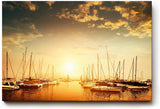 Sinus Art Wandbild 120x80cm Wunderschöner Sonnenuntergang über ruhigem Wasser mit segelnden Booten