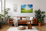 Sinus Art Wandbild 120x80cm Weite Frühlingswiese mit gelben Blüten und strahlendem Himmel für fröhliche Atmosphäre