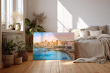 Sinus Art Wandbild 120x80cm Pastellfarbene Häuserzeile an der Küste vor türkisblauem Meer – mediterranes Flair pur