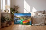 Sinus Art Wandbild 120x80cm Farbkräftige Boote auf spiegelndem Wasser mit Wald und Bergen im Hintergrund