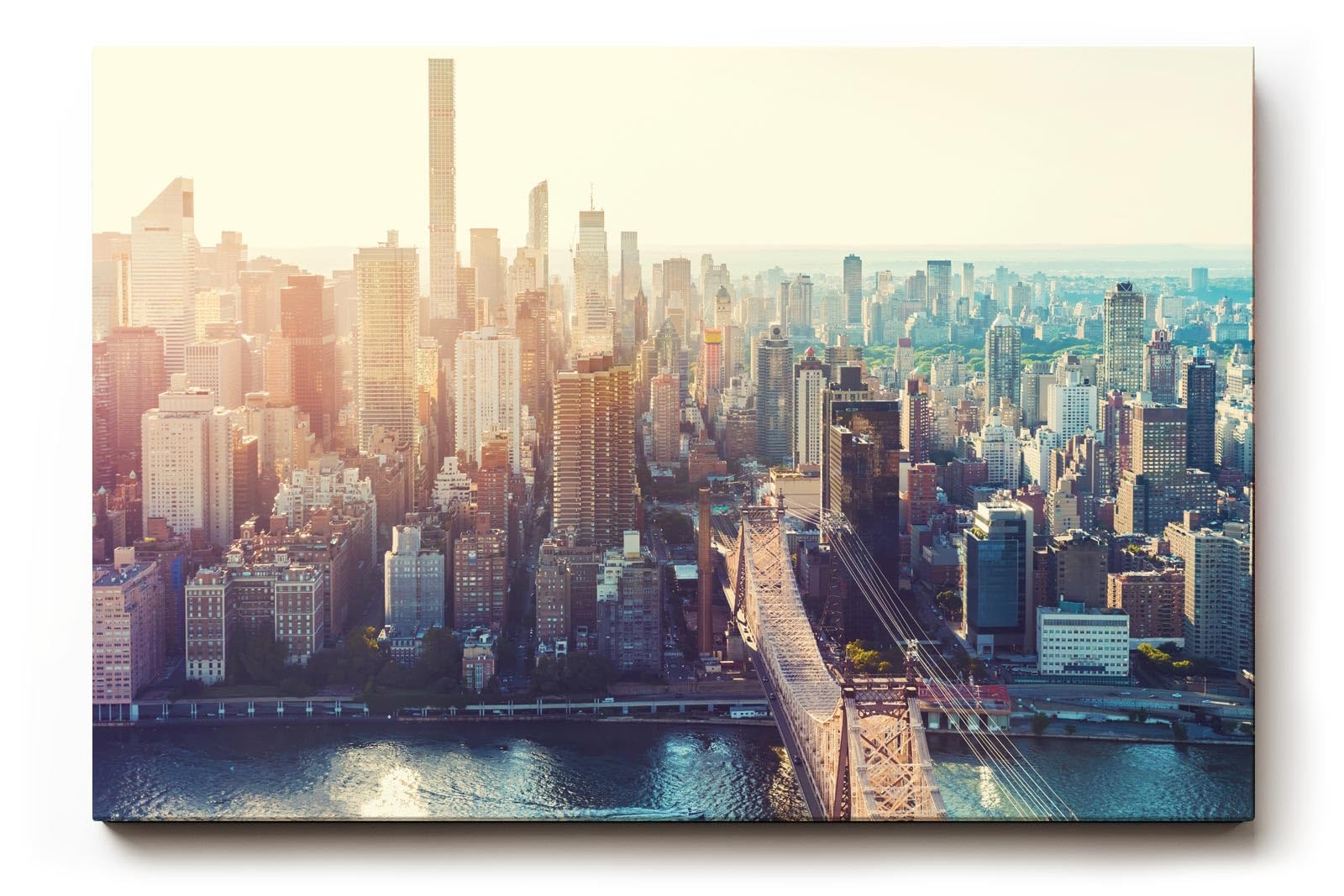 Sinus Art Wandbild 120x80cm Stimmungsvolle Stadtsilhouette mit Brooklyn Bridge und Sonnenlicht über Manhattan