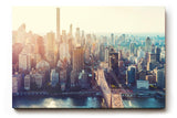 Sinus Art Wandbild 120x80cm Stimmungsvolle Stadtsilhouette mit Brooklyn Bridge und Sonnenlicht über Manhattan