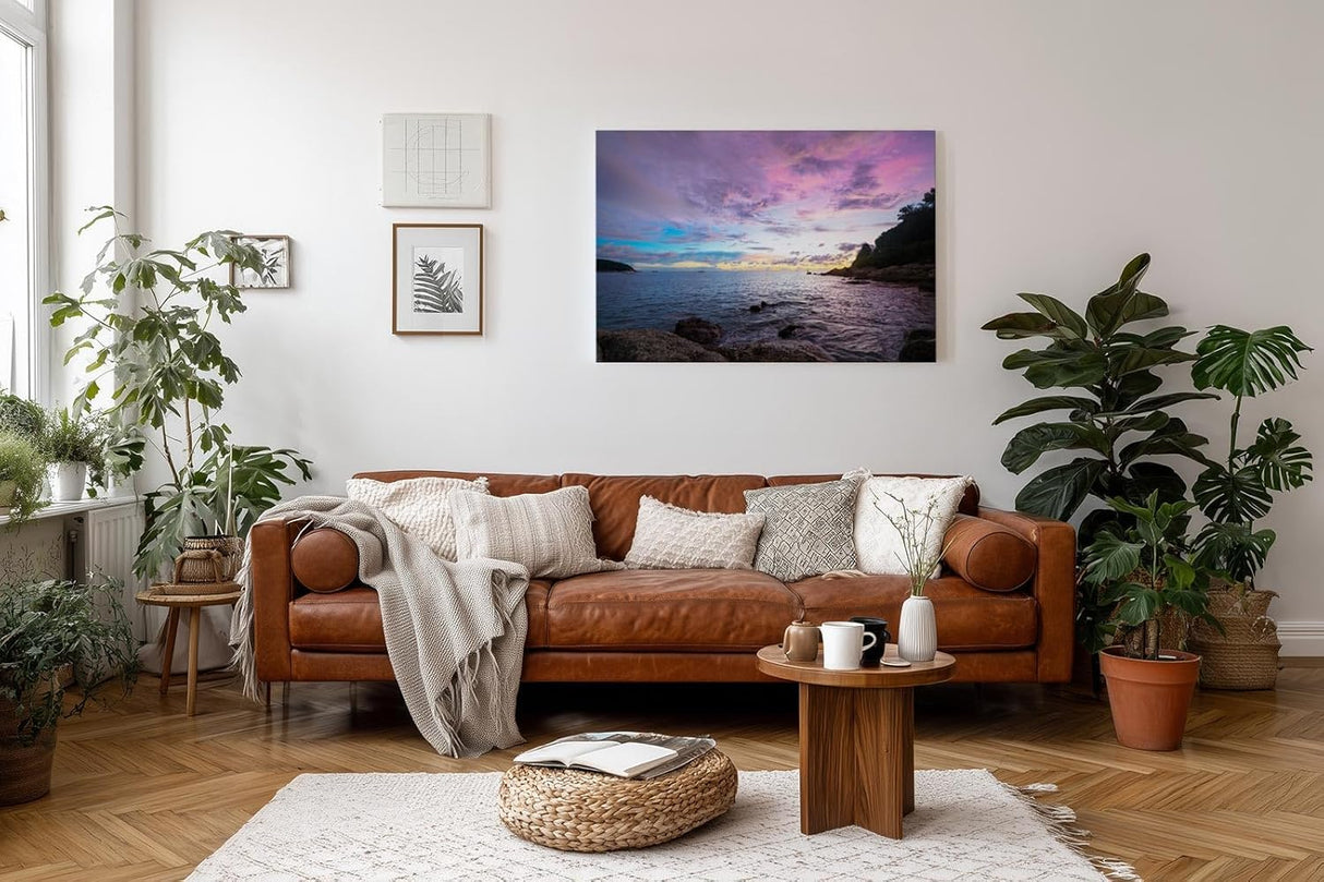Sinus Art Wandbild 120x80cm Dramatisch ruhige Szene einer felsigen Küste bei Sonnenuntergang in pastelligen Tönen