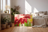 Sinus Art Wandbild 120x80cm Nahaufnahme einer roten Blüte mit glänzenden Wassertropfen – voller Frische und Dynamik