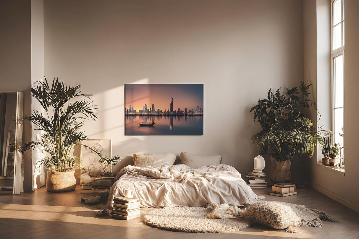 Sinus Art Wandbild 120x80cm Städtische Skyline in der Dämmerung mit reflektierendem Wasser und ruhigem Boot – kontrastreich und elegant