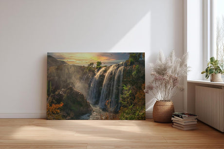 Sinus Art Wandbild 120x80cm Wasserfall-Szenerie im warmen Licht des Sonnenuntergangs mit lebendiger Vegetation