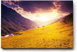 Sinus Art Wandbild 120x80cm Sonnenuntergang taucht Bergwiese in goldenes Licht mit dramatischem Himmel
