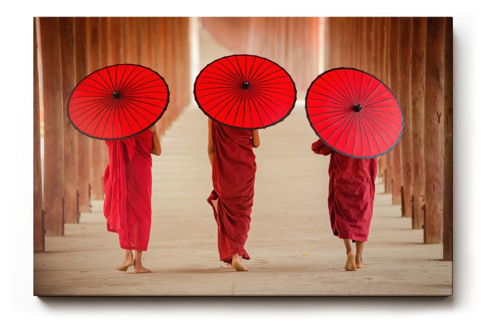 Sinus Art Wandbild 120x80cm Drei Mönche mit traditionellen Schirmen in rhythmischer Komposition