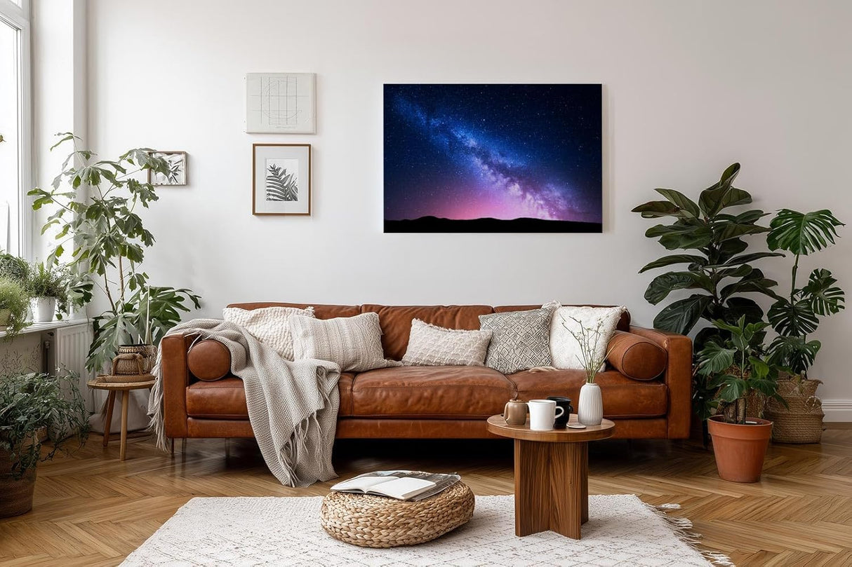 Sinus Art Wandbild 120x80cm Die Milchstraße spannt sich in leuchtenden Farben über eine dunkle Landschaft