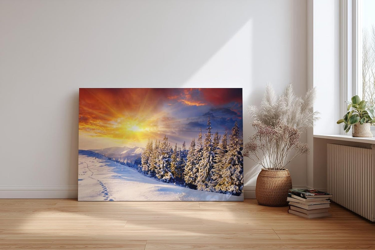 Sinus Art Wandbild 120x80cm Schneebedeckter Nadelwald im Morgenlicht – intensiv, leuchtend und ruhig zugleich