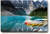 Sinus Art Wandbild 120x80cm Bergsee mit Kanus vor atemberaubender Bergkulisse für inspirierende Raumwirkung