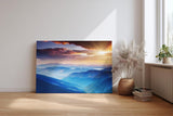 Sinus Art Wandbild 120x80cm Faszinierende Berglandschaft in verschiedenen Blauabstufungen mit goldener Sonne