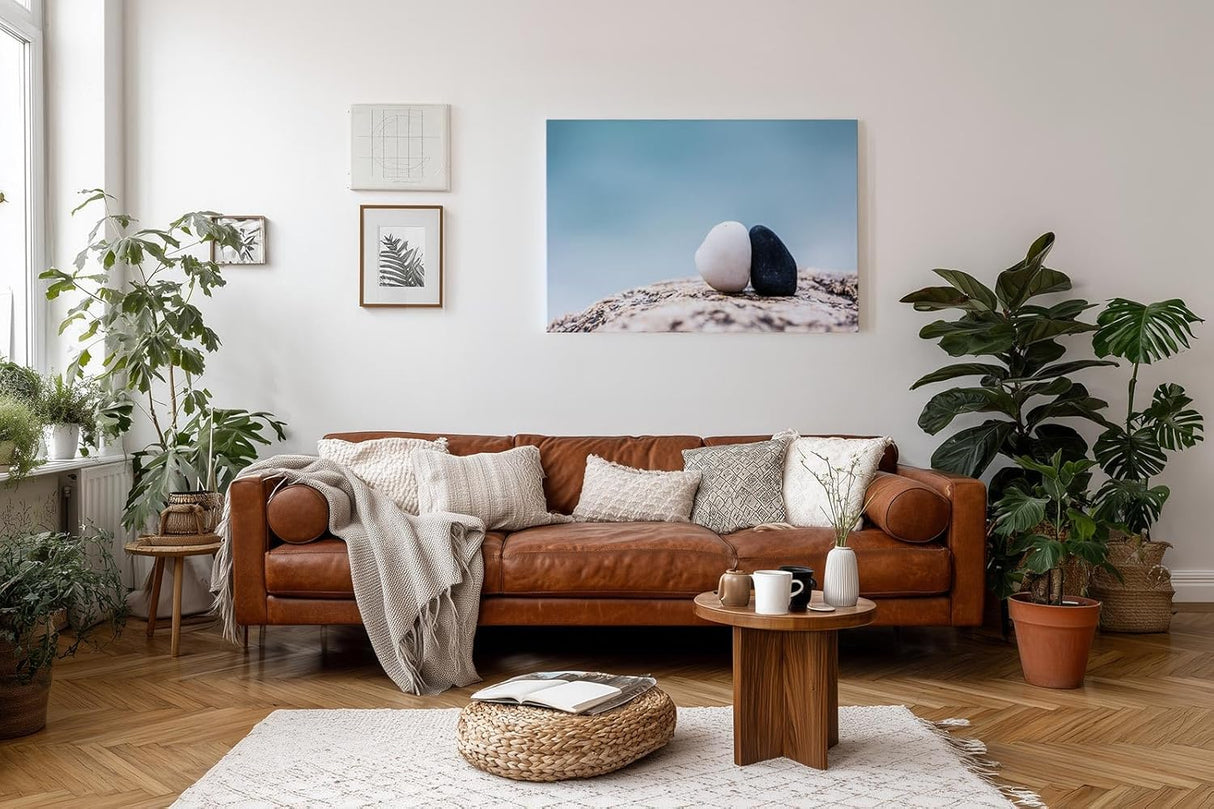 Sinus Art Wandbild 120x80cm Zwei kontrastierende Steine auf Fels in harmonischer Zweisamkeit am ruhigen Wasser