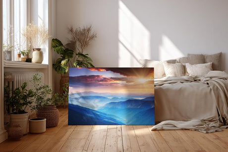 Sinus Art Wandbild 120x80cm Faszinierende Berglandschaft in verschiedenen Blauabstufungen mit goldener Sonne